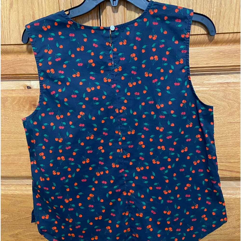 cute sleeveless cherry top.  Only worn once. Bought from Nordstrom Rack.